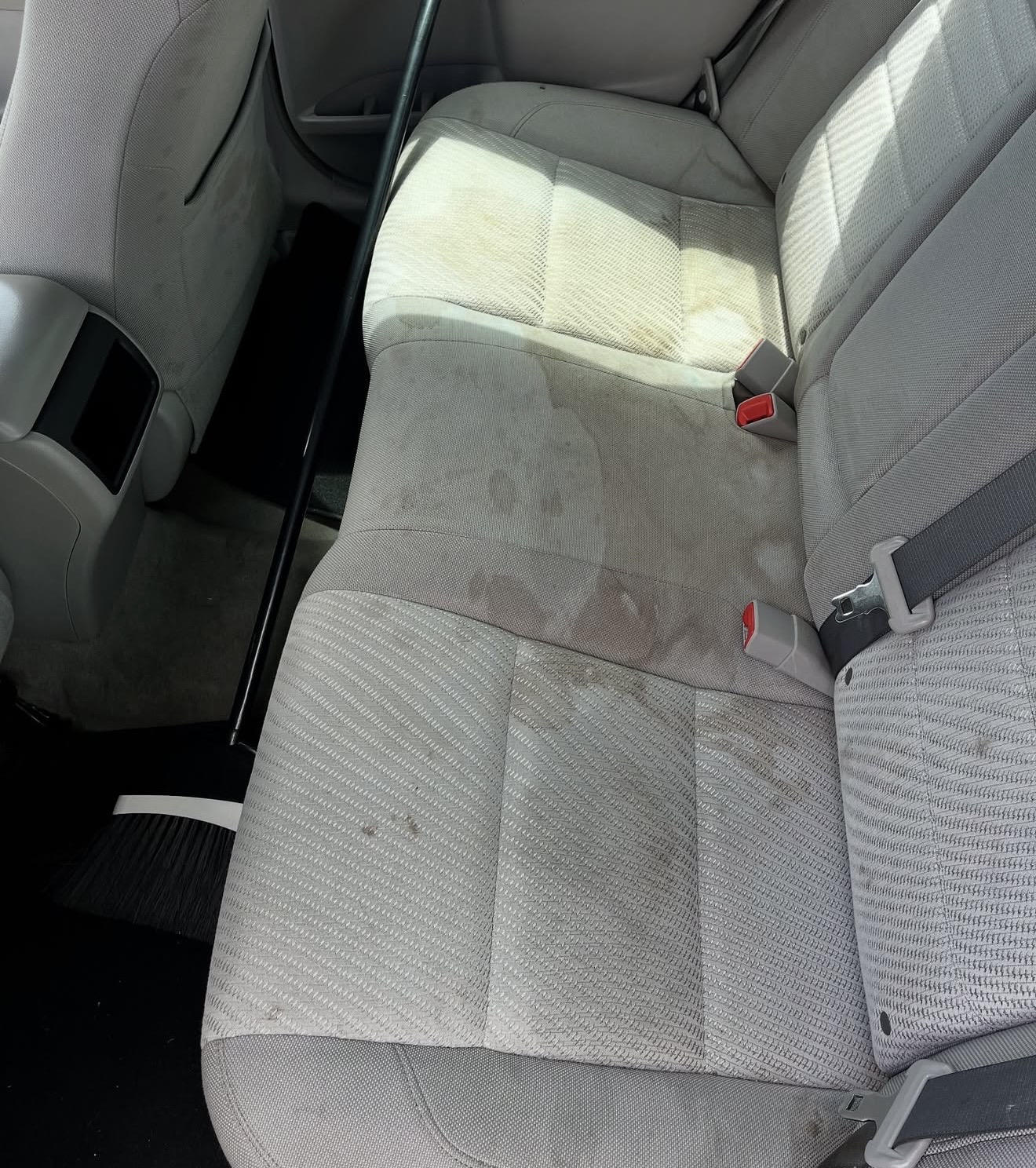 Dirty rear seat before detailing